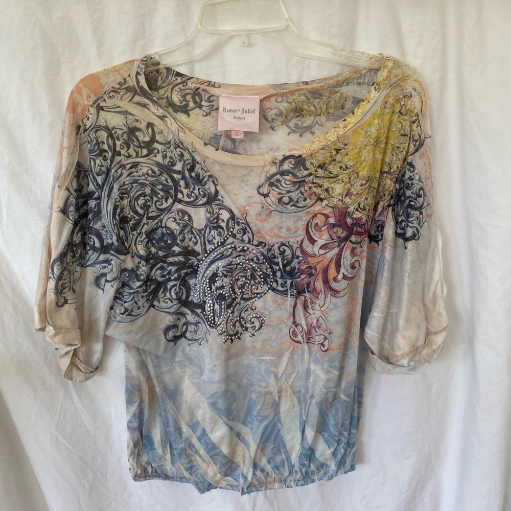 Women’s patterned, bedazzled top
